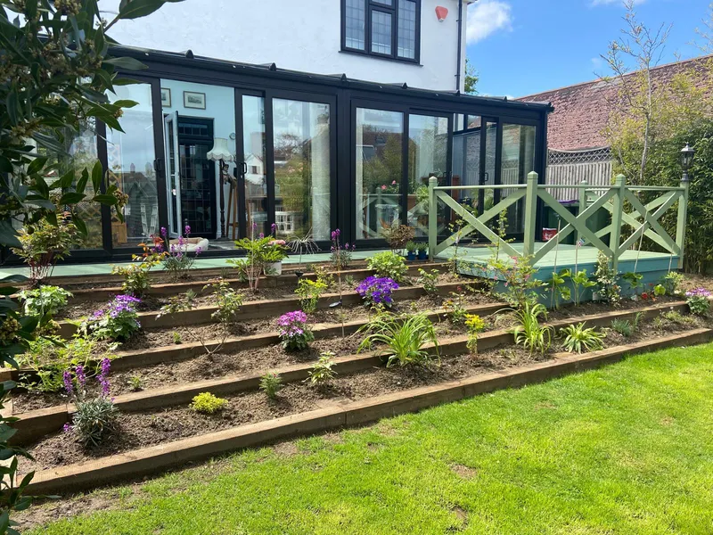 Garden decking laid in solid timber sleepers