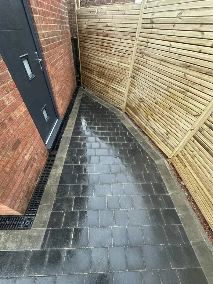 Block paved drive with curved fencing in Herne Bay